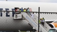 first deportees from US to africa 20 People Deported from US Arrive in Liberia Under New Agreement